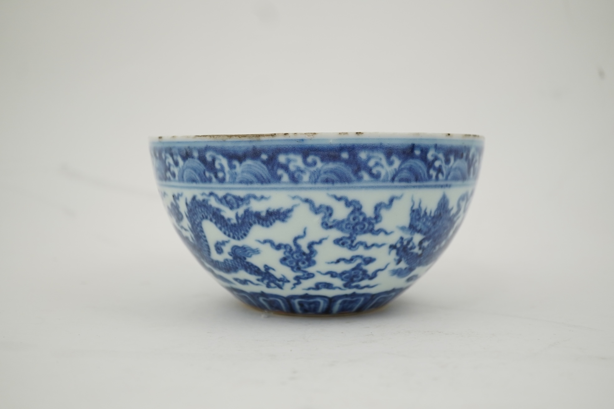 A Chinese blue and white ‘dragon’ dice bowl, Xuande mark, probably late Qing dynasty